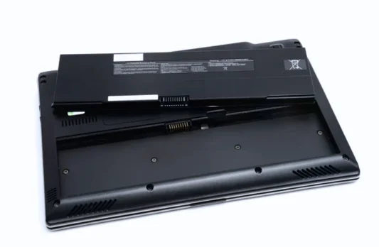 Laptop showing sleek design and interface, highlighting modern tech and laptop battery replacement focus.