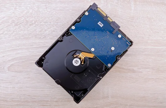 Black device with blue casing, highlighting design and focus on laptop hard drive repair and SSD install.